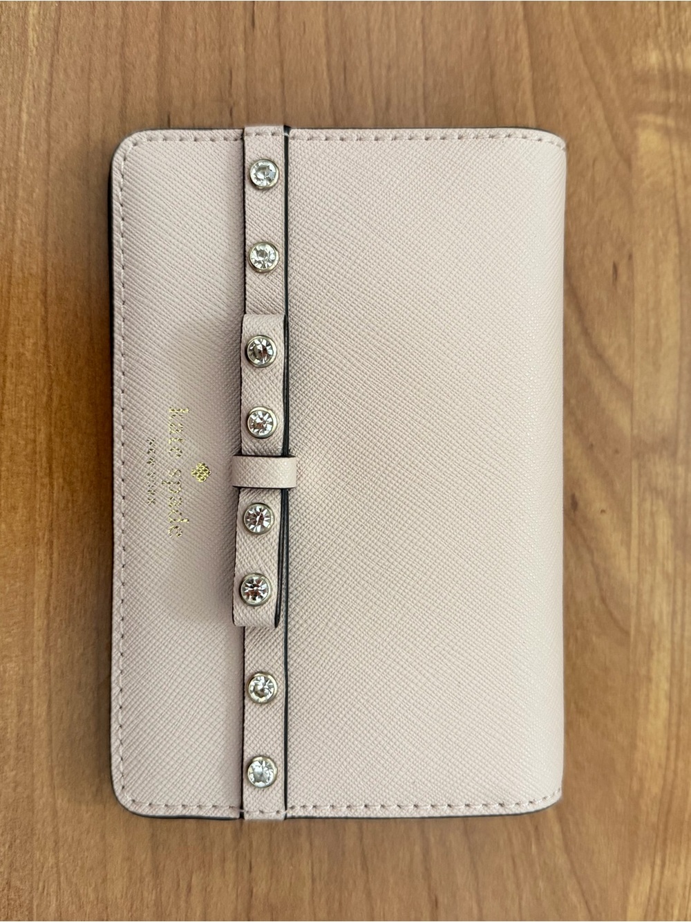 kate spade light pink bow-stud bifold wallet